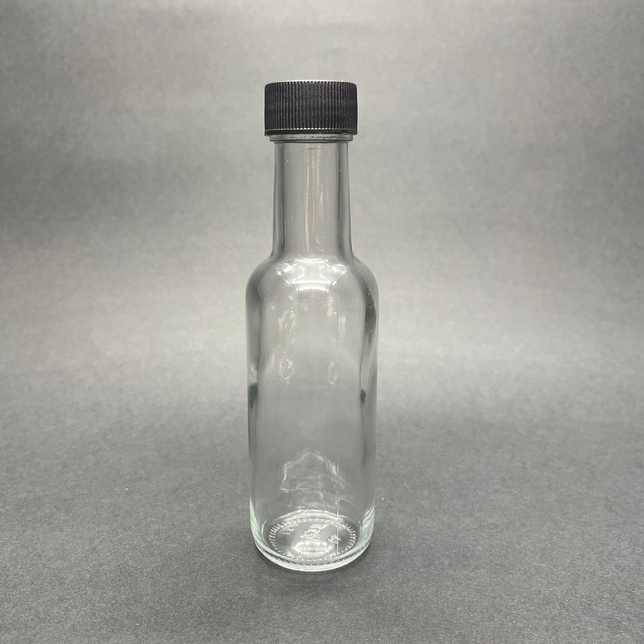100 Cc Dorika Cam Şişe - Siyah Contalı Kapaklı (Ağız Çapı 25 Mm) - 100 Ml Şeffaf Cam Dorika Şişe