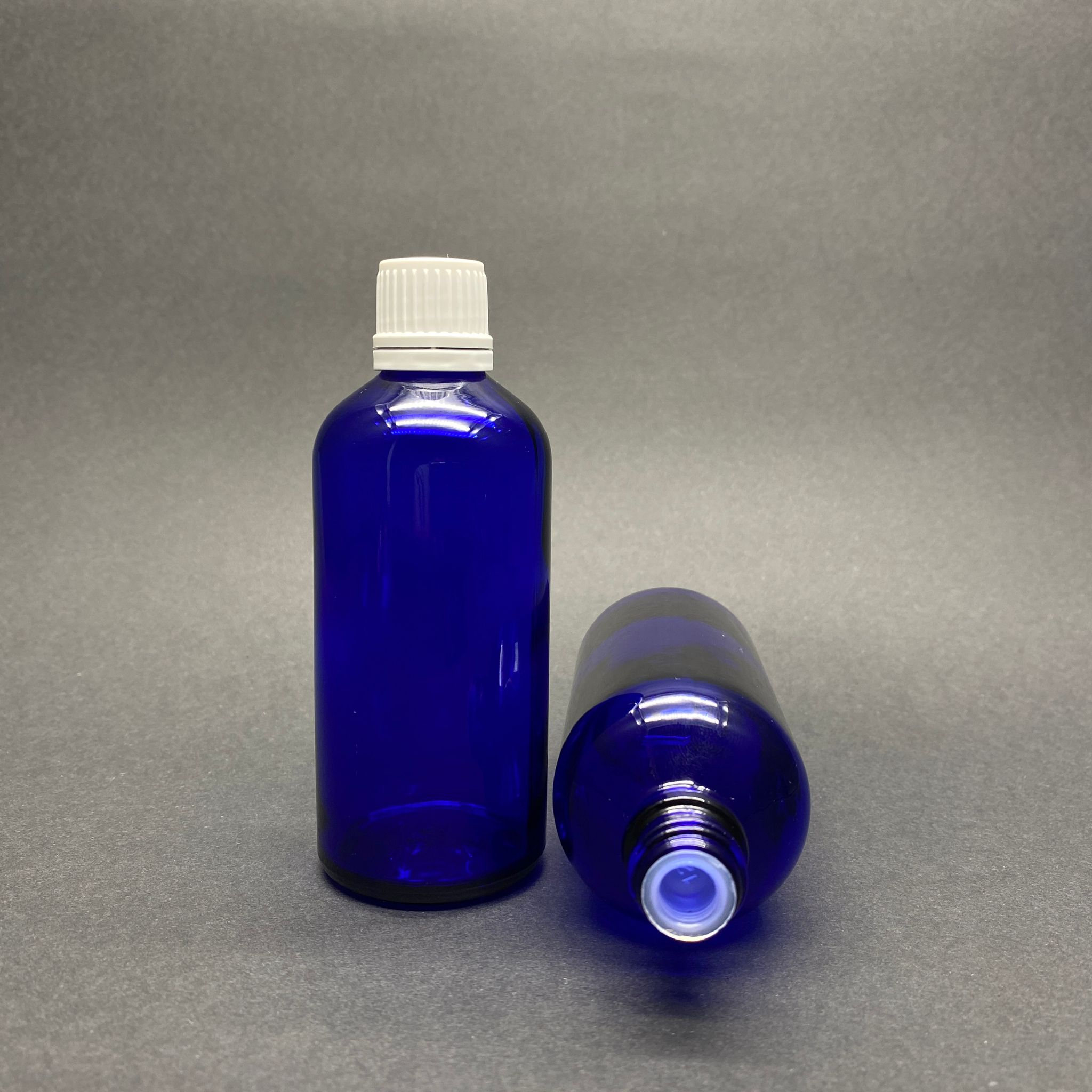 100 Cc Mavi Beyaz Kilit Kapaklı - Kör Tıpalı Cam Şişe - 100 Ml Mavi Kilitli Kapaklı Kör Tıpalı Cam Şişe