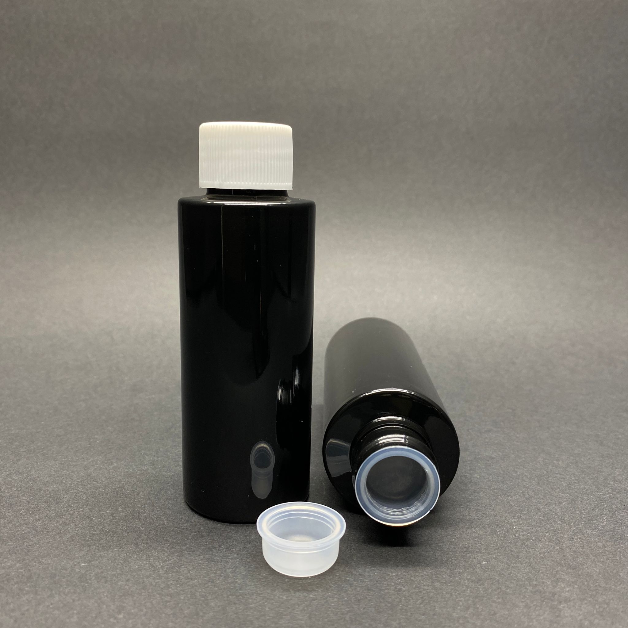 100 Cc Silindir Keskin Küt Model Sert (17 Gr) Pet Şişe - Beyaz Contalı Kapaklı + Kör Tıpalı - Ağız Çapı 24 Mm - Siyah