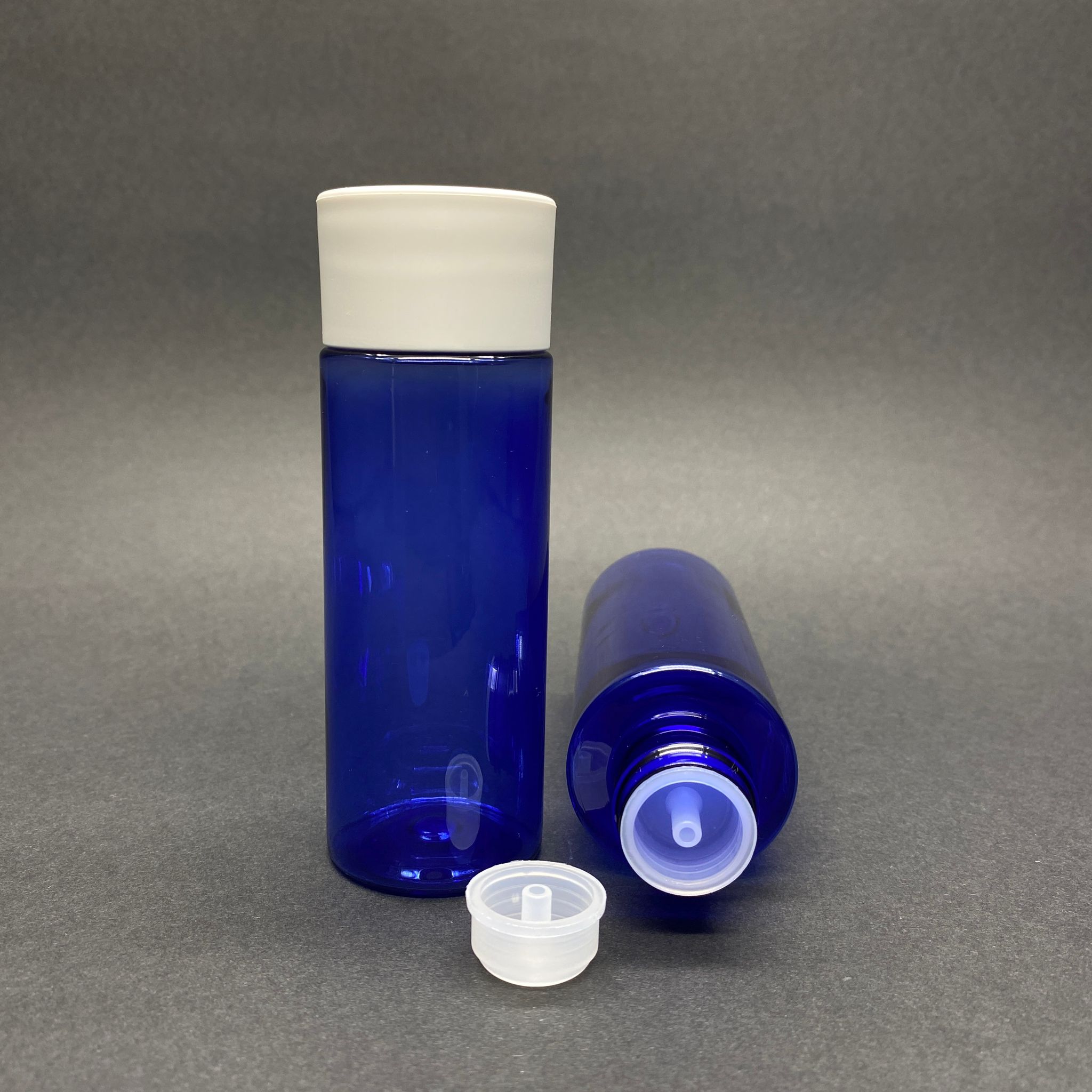 100 Cc Silindir Keskin Küt Model Sert (17 Gr) Pet Şişe - Beyaz Derin Kapaklı + Kolonya Tıpalı - Ağız Çapı 24 Mm - Mavi (Kolonya Şişesi, Losyon Şişesi, Gülsuyu Şişesi, Şampuan Şişesi Vb. Çok Amaçlı Kalın Pet Şişe)
