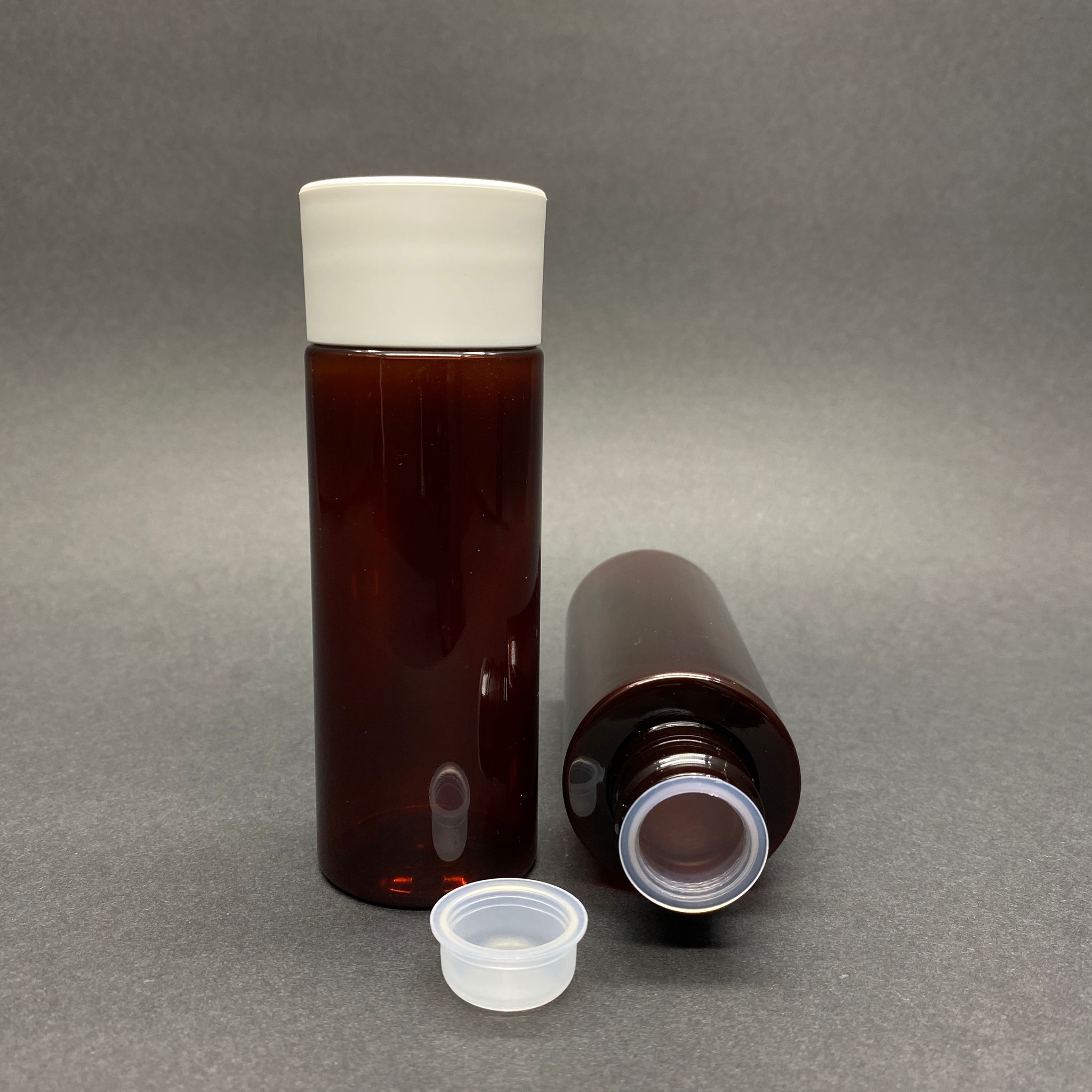 100 Cc Silindir Keskin Küt Model Sert (17 Gr) Pet Şişe - Beyaz Kalın Kapaklı + Kör Tıpalı - Ağız Çapı 24 Mm - Amber
