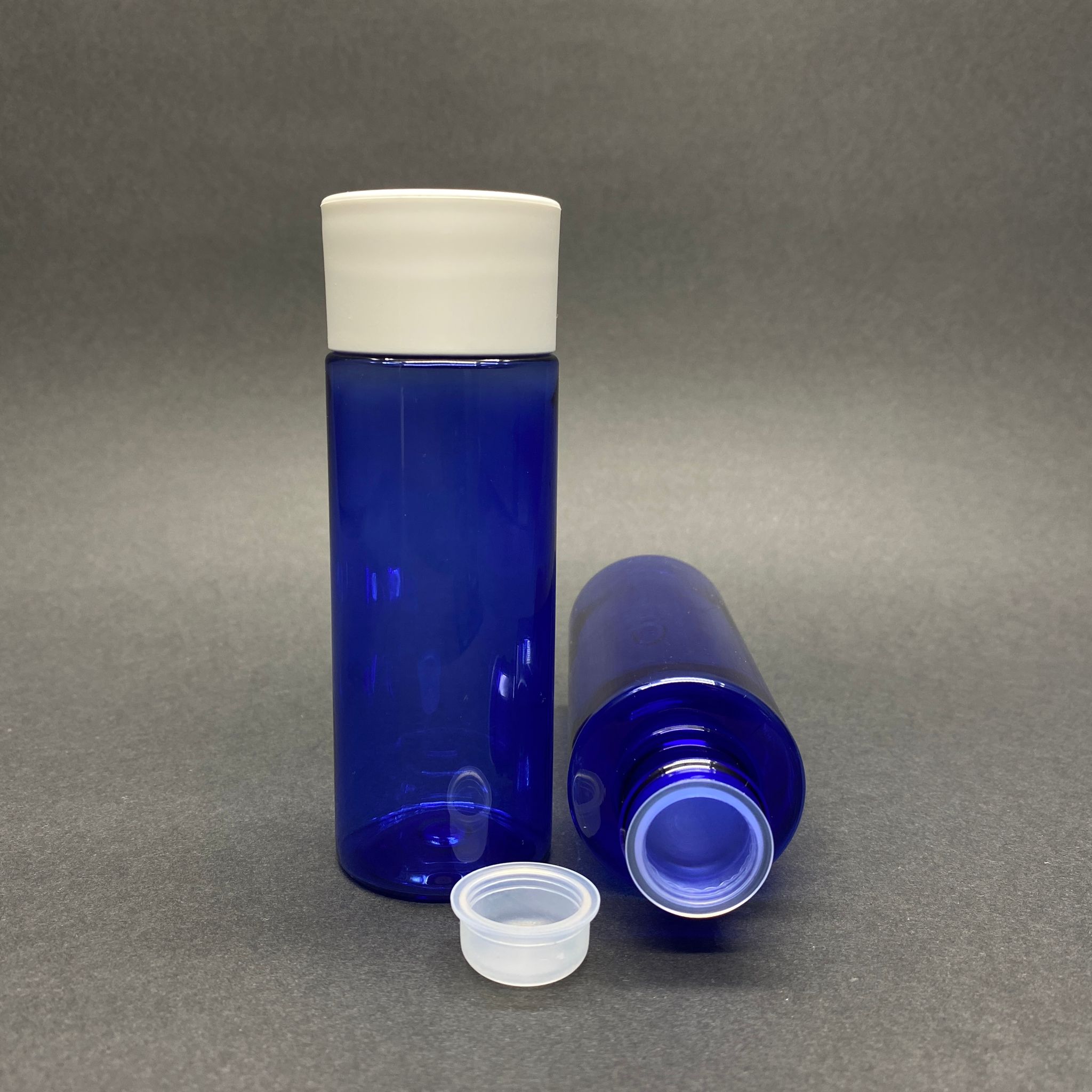 100 Cc Silindir Keskin Küt Model Sert (17 Gr) Pet Şişe - Beyaz Kalın Kapaklı + Kör Tıpalı - Ağız Çapı 24 Mm - Mavi
