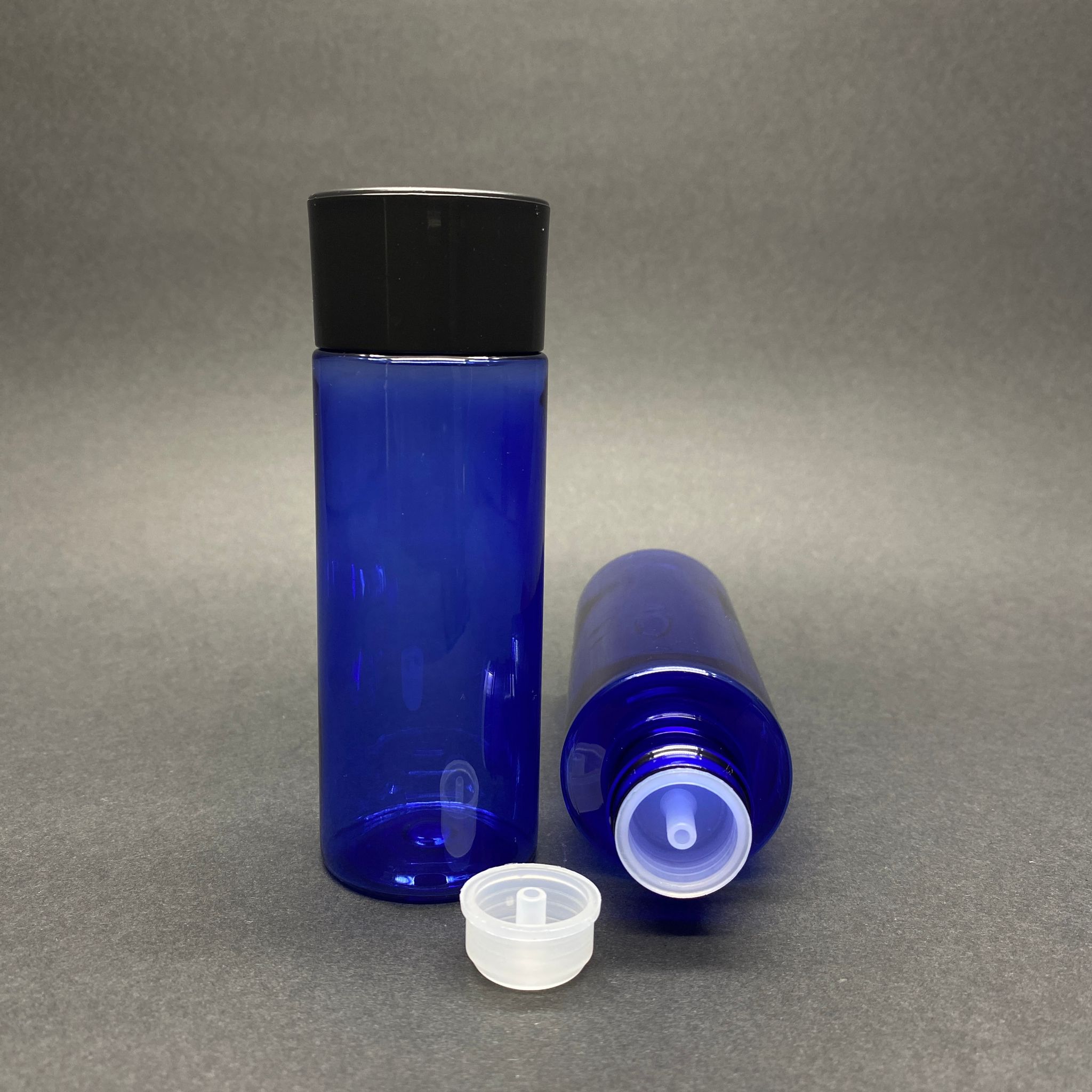 100 Cc Silindir Keskin Küt Model Sert (17 Gr) Pet Şişe - Siyah Derin Kapaklı + Kolonya Tıpalı - Ağız Çapı 24 Mm - Mavi (Kolonya Şişesi, Losyon Şişesi, Gülsuyu Şişesi, Şampuan Şişesi Vb. Çok Amaçlı Kalın Pet Şişe)