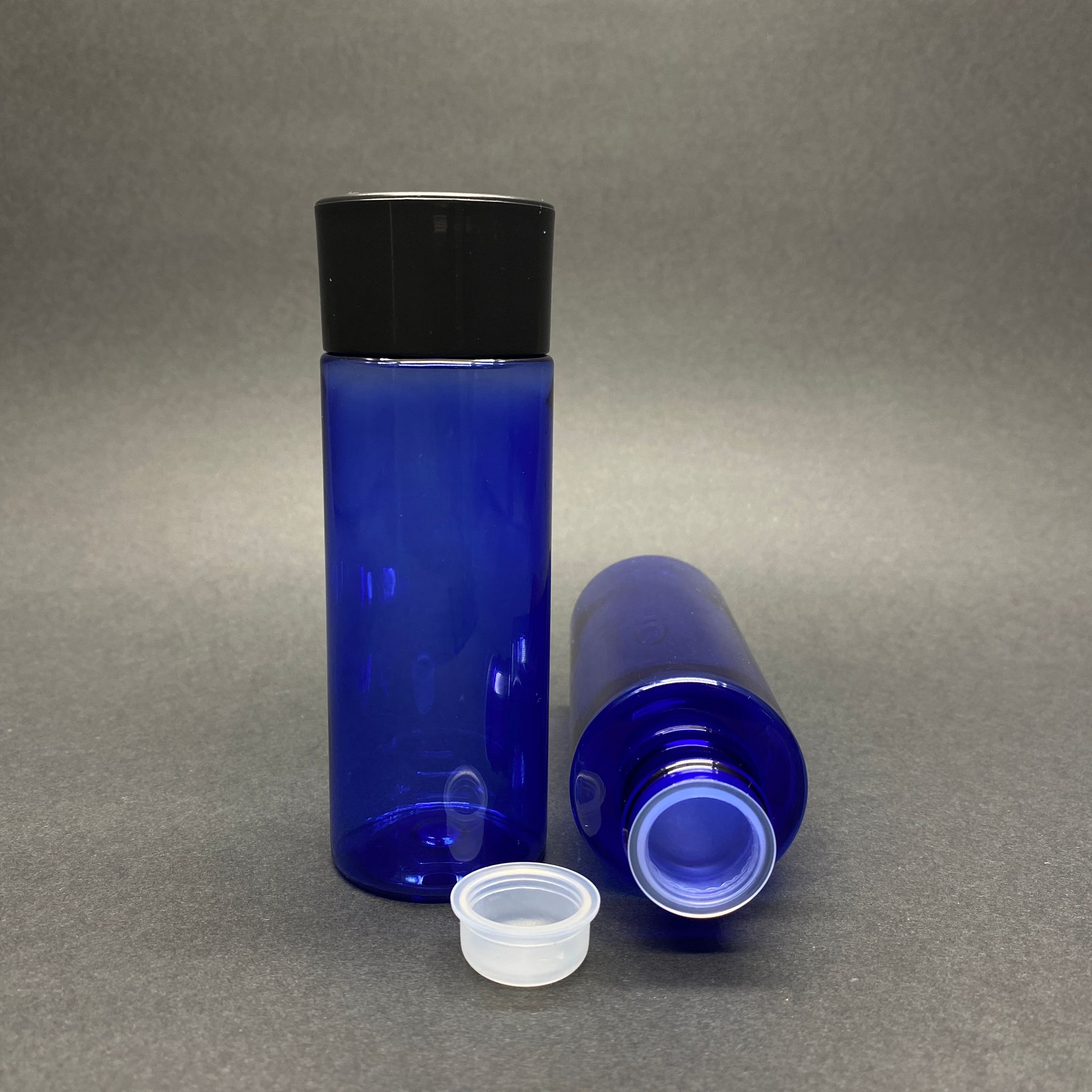 100 Cc Silindir Keskin Küt Model Sert (17 Gr) Pet Şişe - Siyah Kalın Kapaklı + Kör Tıpalı - Ağız Çapı 24 Mm - Mavi