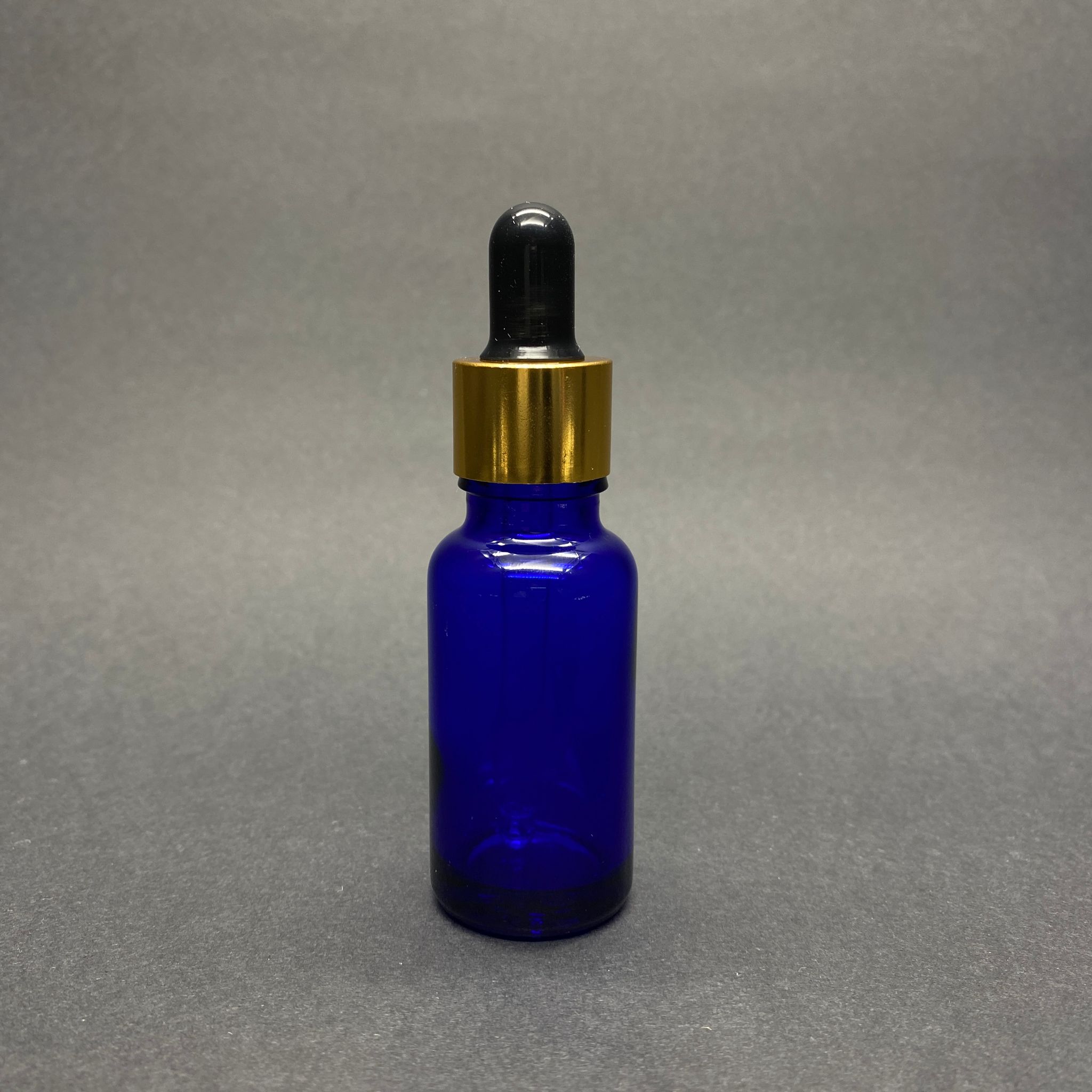20 Cc Mavi Cam Damlalıklı Şişe - Siyah Emzik - Gold Metalik Kapak - 20 Ml Mavi Cam Damlalıklı Şişe