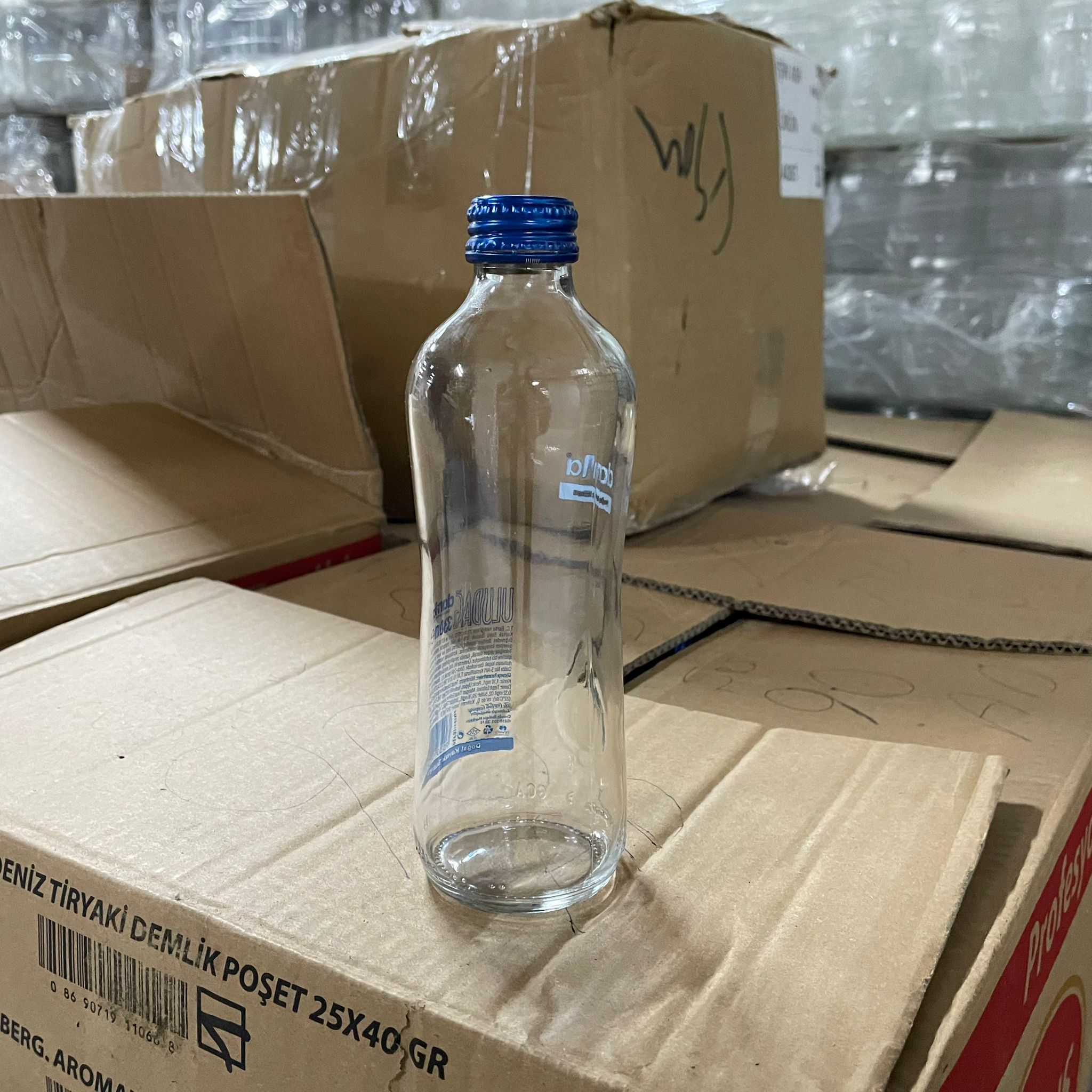 330 Cc Boş Cam Su Şişesi - Kullanılmış 2. El Cam Şişe - Cafeteryada Kullanılmış Uygun Fiyatlı Cam Şişe - Kapaklı - 330 Ml Damla Su Şişesi