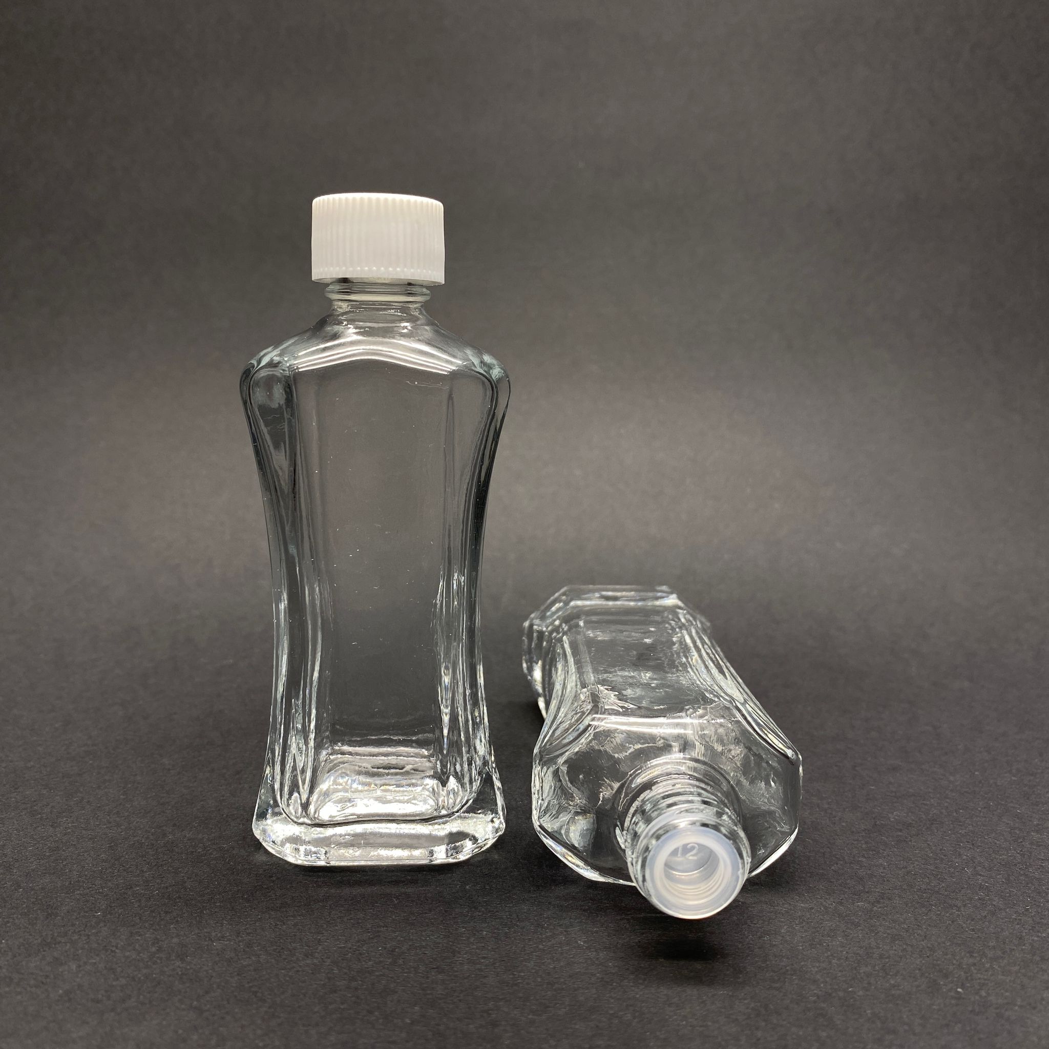 50 Cc Milano Model Beyaz Kapaklı Kör Tıpalı Cam Şişe - 50 Ml Beyaz Kapaklı Kör Tıpalı Cam Şişe (Camın Kalınlığı İle İlgili +/- 5 Ml Tolerans Olabilir)
