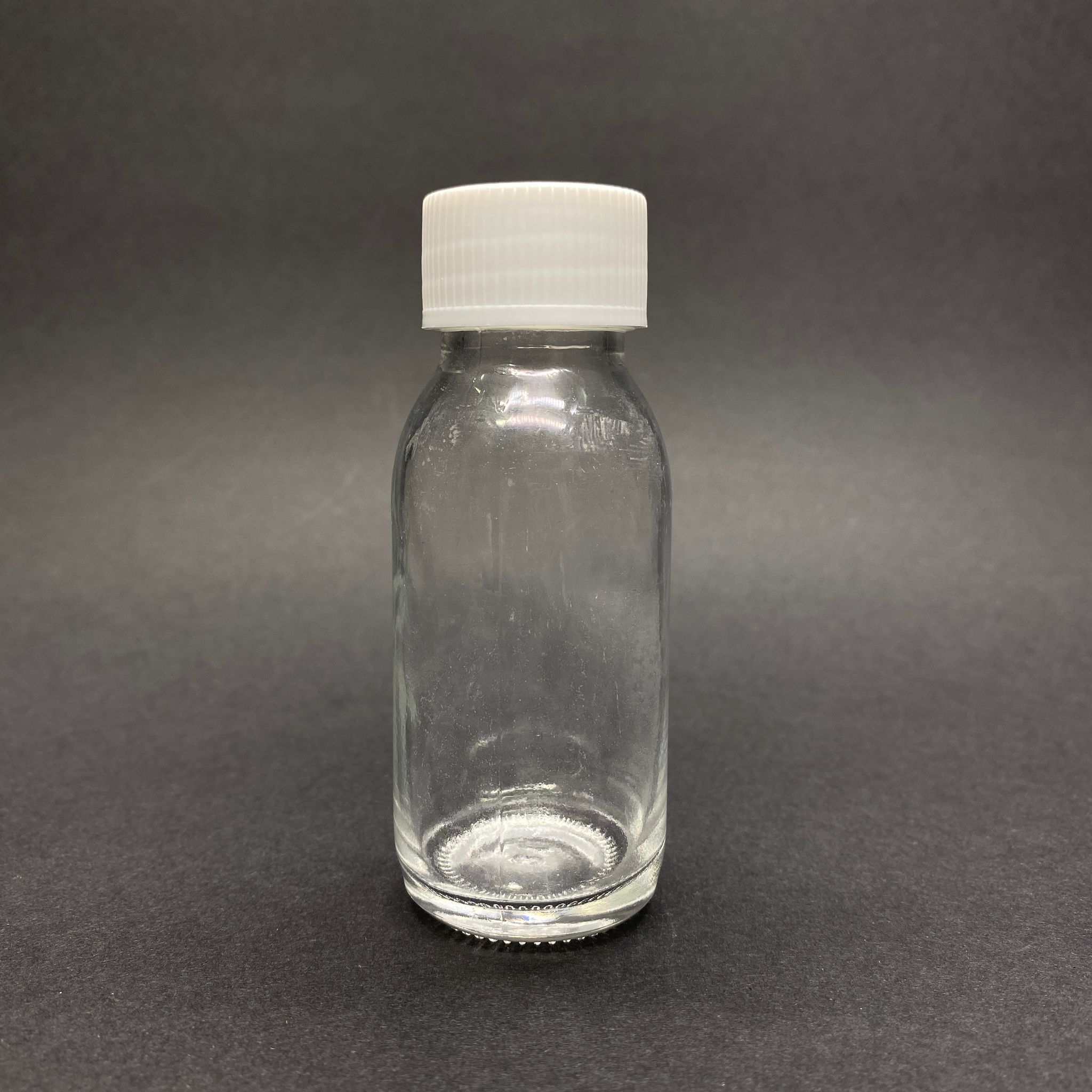 60 Cc Geniş Ağızlı Şeffaf Cam Şişe - Beyaz Kapaklı (28 Ağız) - 60 Ml Şeffaf Ecza Şişesi - Mikroplardan Korunması İçin İlaçlanmıştır, Suya Tutunca Şeffaf Rengi Alır